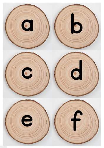 Classroom lower case letters on wood log slices