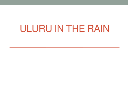 Uluru in the rain; desert biome
